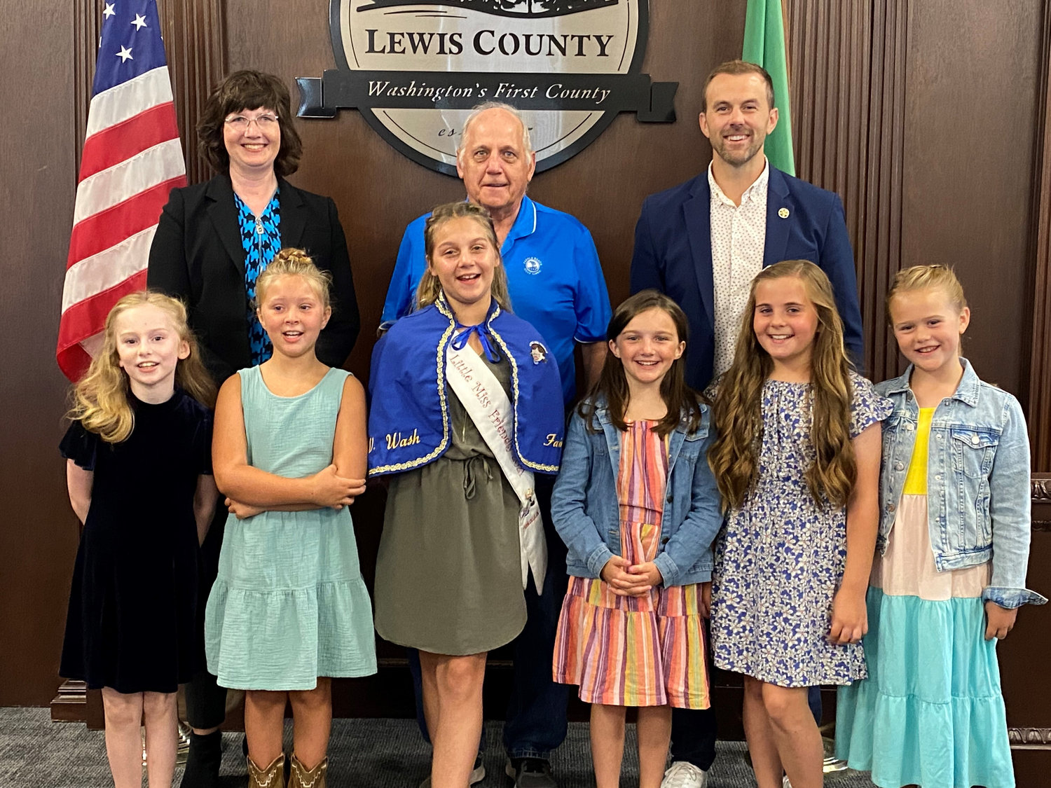 Little Miss Friendly MaKayla Maynard and finalists Ella Hughes, Finley Swope, Emma Britton, Gracelyn Briggs and Jaxsyn Lowrey pose for a photo with Lewis County commissioners Sean Swope, Lee Grose and Lindsey Pollock this week.
